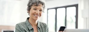 Older woman with a phone in her hand