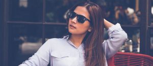 woman thinking about getting veneers
